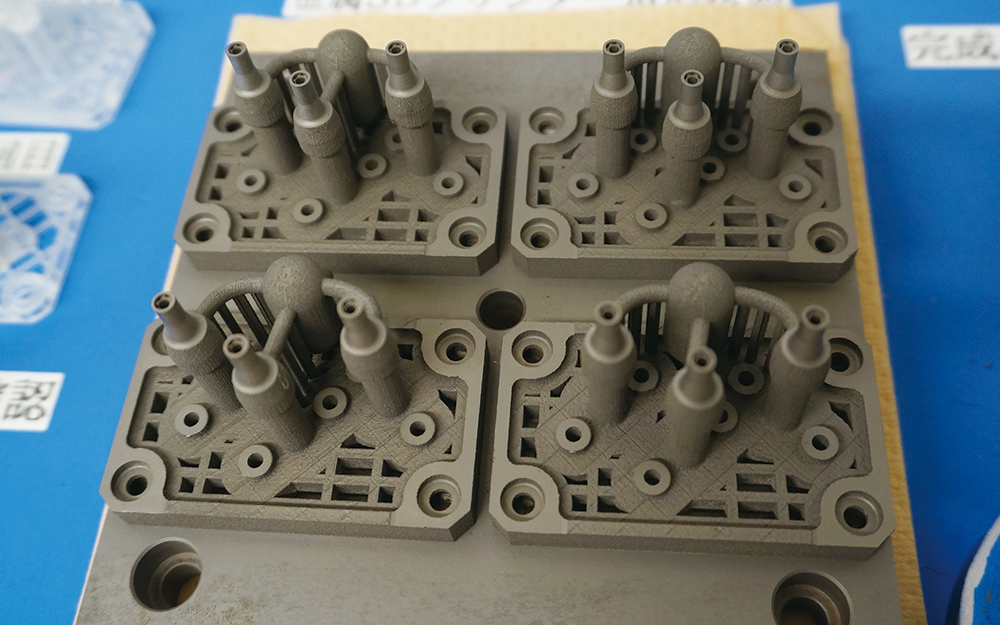 优化吸附力的吸嘴。金属3D打印机还能完成传统加工方法难以实现的孔加工。